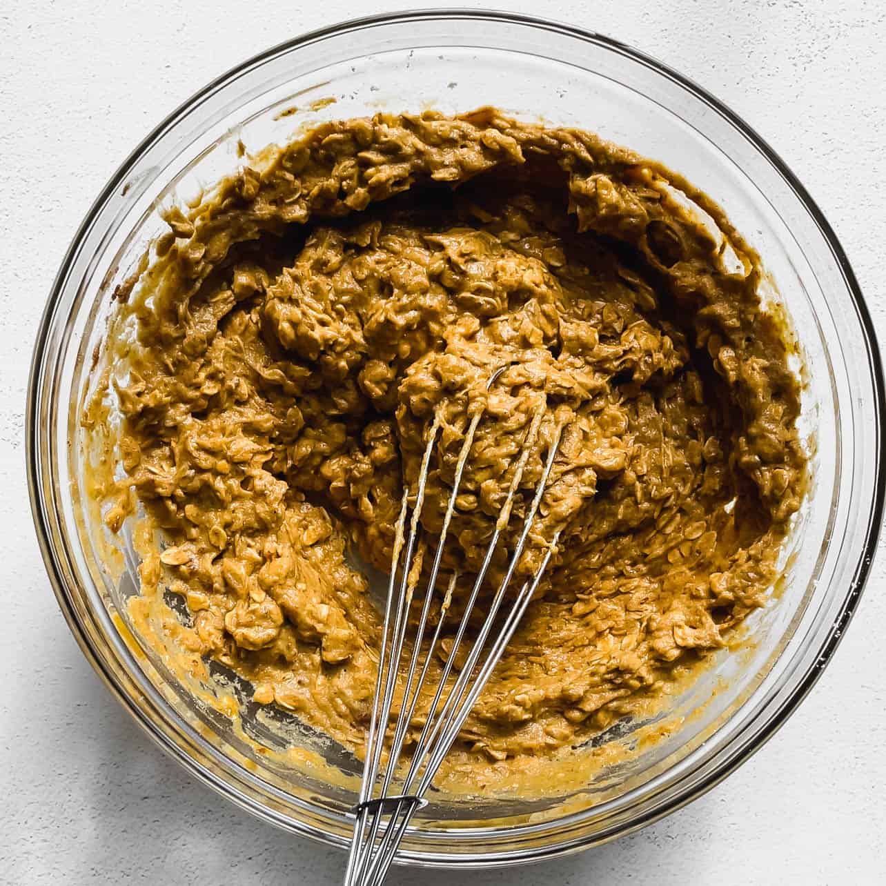 bowl of ingredients for Easy Vegan and Gluten-Free Pumpkin Oatmeal Muffins